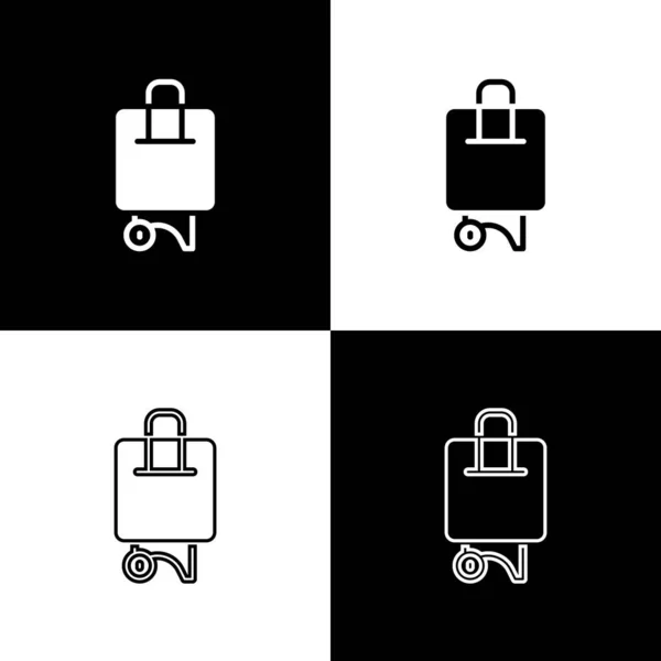 Set Valise pour icône de voyage isolée sur fond noir et blanc. Panneau des bagages de voyage. Icône bagages de voyage. Vecteur — Image vectorielle