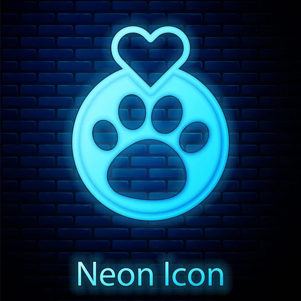 Glowing neon Heart with animals footprint icon isolated on brick wall background. Pet paw in heart. Love to the animals. Vector — Stock Vector