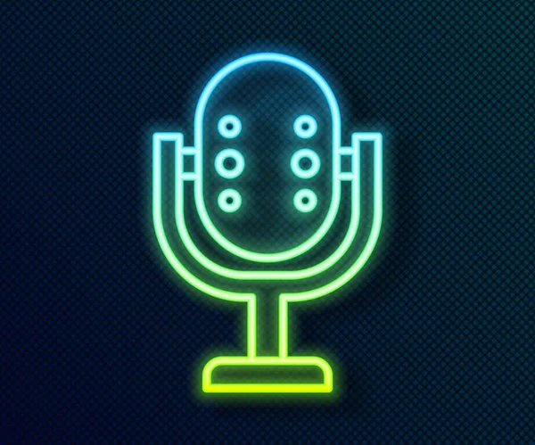 Glowing neon line Microphone icon isolated on black background. On air radio mic microphone. Speaker sign. Vector — Stock Vector