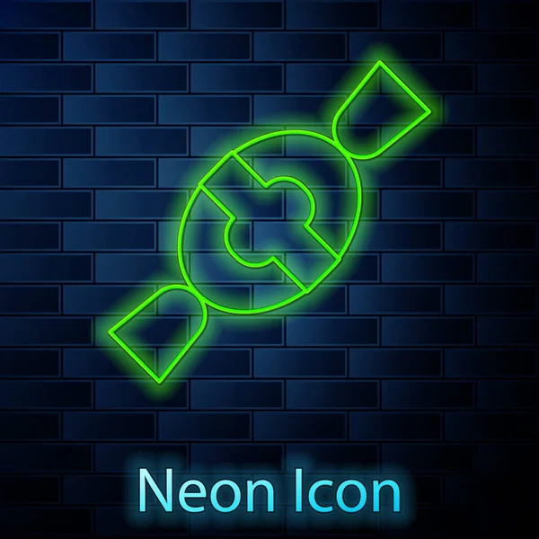 Leuchtende Neon-Linie Candy-Symbol isoliert auf Backsteinwand Hintergrund. Frohe Halloween-Party. Vektor — Stockvektor