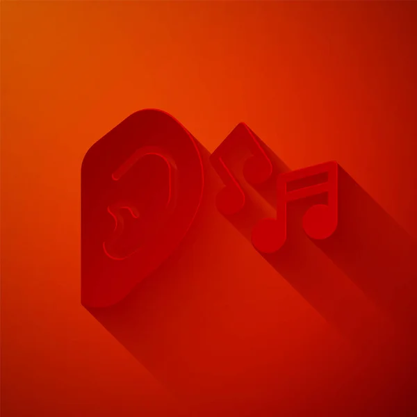 Паперовий вирізаний вухо слухайте піктограму звукового сигналу ізольовано на червоному тлі. Вухо слуху. Стиль паперового мистецтва. Векторні — стоковий вектор