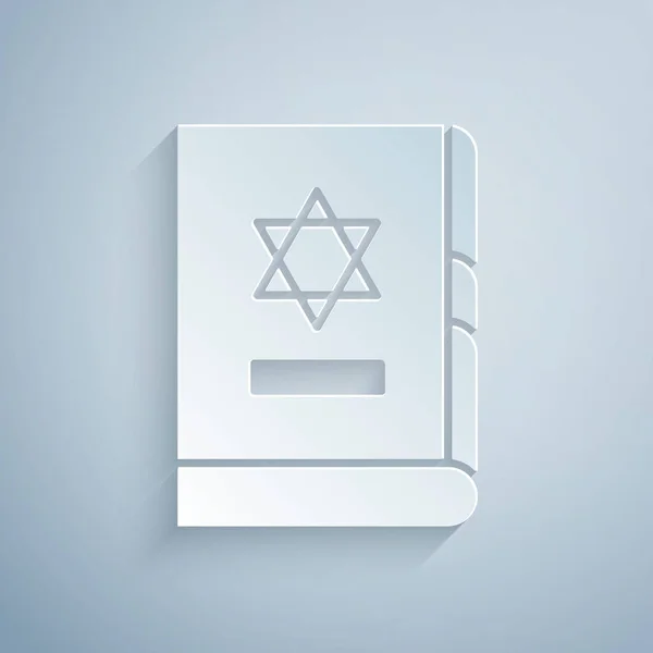 Paper klippa judisk torah bok ikon isolerad på grå bakgrund. På omslaget till Bibeln är bilden av Davids stjärna. Papperskonst. Vektor Illustration — Stock vektor