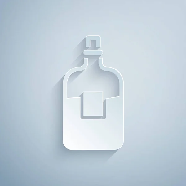 Řez papíru Skleněná láhev vodky ikona izolované na šedém pozadí. Papírový styl. Vektor — Stockový vektor