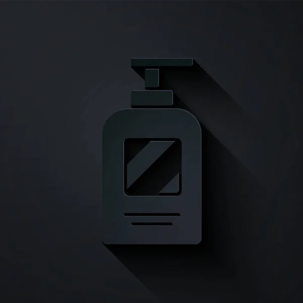 Carta tagliata Bottiglia di icona shampoo isolata su sfondo nero. Stile cartaceo. Illustrazione vettoriale — Vettoriale Stock