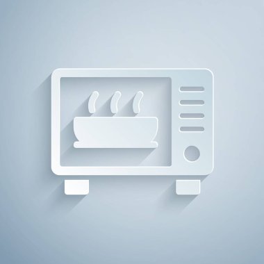 Kağıt kesiği mikrodalga fırın ikonu gri arka planda izole edilmiş. Ev aletleri simgesi. Kağıt sanatı tarzı. Vektör