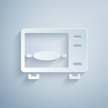 Kağıt kesiği mikrodalga fırın ikonu gri arka planda izole edilmiş. Ev aletleri simgesi. Kağıt sanatı tarzı. Vektör
