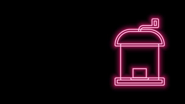 Glödande neon line Manuell kaffekvarn ikon isolerad på svart bakgrund. 4K Video motion grafisk animation — Stockvideo