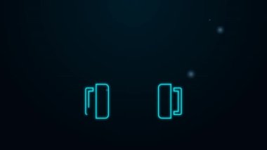 Parlayan neon hattı kulaklık simgesi siyah arkaplanda izole edildi. Kulaklıklar. Müzik, hizmet, iletişim ve operatör konsepti. 4K Video hareketli grafik canlandırması