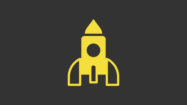 Žlutá Rocket loď hračka ikona izolované na šedém pozadí. Vesmírné cestování. Grafická animace pohybu videa 4K — Stock video