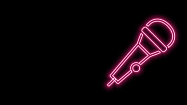 Glowing neon line Microphone icon isolated on black background. On air radio mic microphone. Speaker sign. 4K Video motion graphic animation — Stock Video