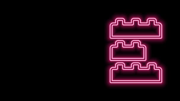 Glowing neon line Toy building block bricks for children icon isolated on black background. 4K Video motion graphic animation — Stock Video