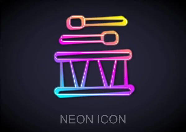 Gloeiende neon lijn Trommel met drumsticks pictogram geïsoleerd op zwarte achtergrond. Muziekbord. Muziekinstrument symbool. Vector — Stockvector