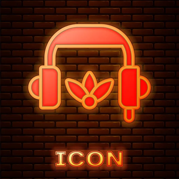 Leuchtende Neon-Kopfhörer für Meditation Ikone isoliert auf Backsteinwand Hintergrund. Vektor — Stockvektor