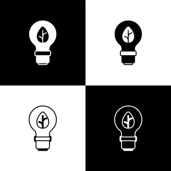 Állítsa villanykörte levél ikon elszigetelt fekete-fehér háttér. Ökoenergia-koncepció. Alternatív energia koncepció. Vektor — Stock Vector
