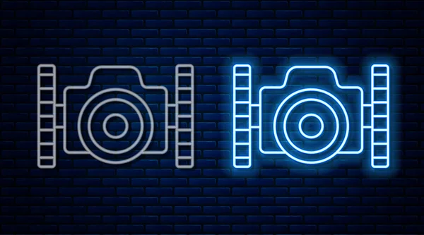 Leuchtende Neon Line Fotokamera für Taucher Ikone isoliert auf Backsteinwand Hintergrund. Ikone der Fotokamera. Tauchausrüstung. Vektor — Stockvektor