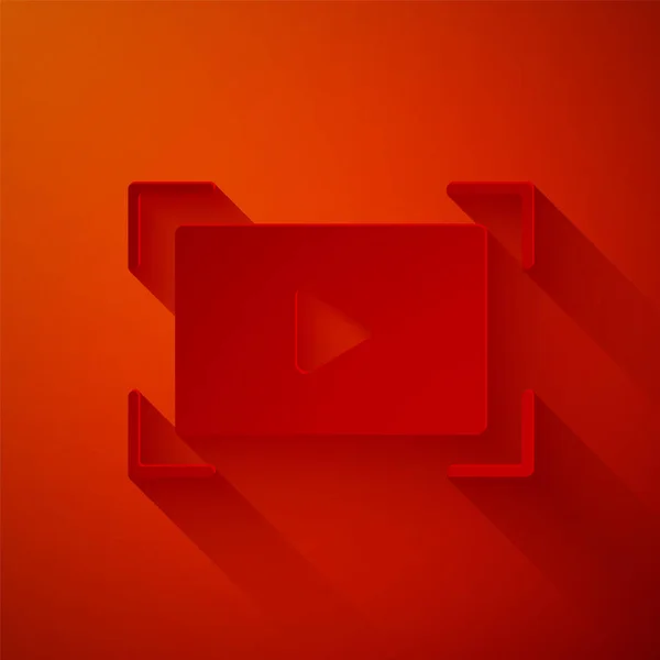 Paper cut Online play video icon isolated on red background. Film strip with play sign. Paper art style. Vector — Stock Vector