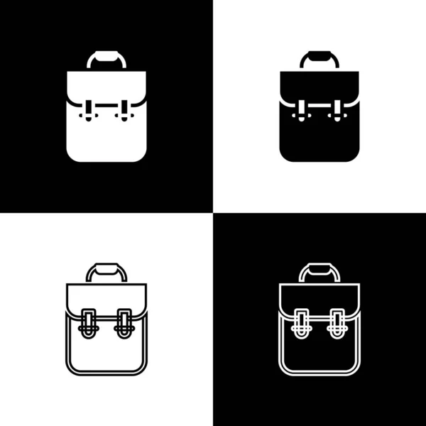 Set Icono de mochila escolar aislado sobre fondo blanco y negro. Vector — Vector de stock