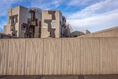Edinburgh, Scotland - January 18, 2020: Exterior walls of Scottish Parliament building in Edinburgh clipart