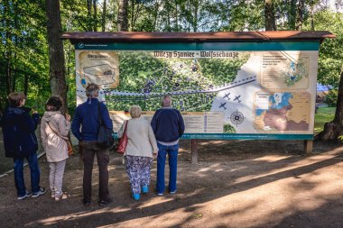 Gierloz, Poland - August 23, 2017: People visits Wilczy Szaniec - Wolfs Lair, first Eastern Front military headquarters of Hitler clipart