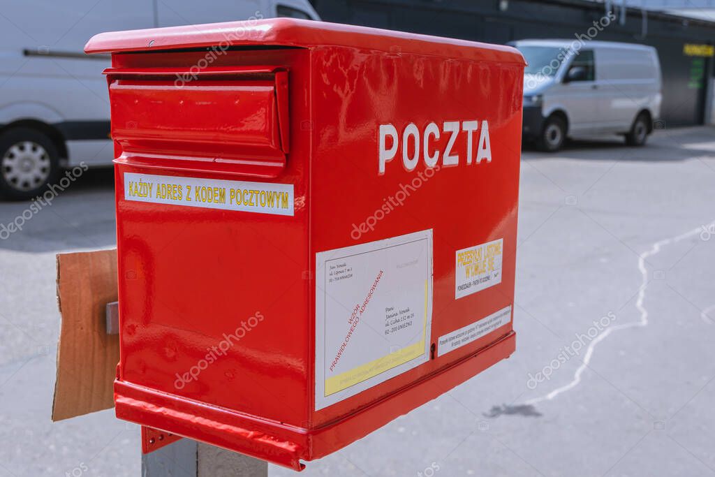 Warsaw, Poland - April 10, 2021: Red mail box of Polish post office - Poczta Polska in Warsaw capital city