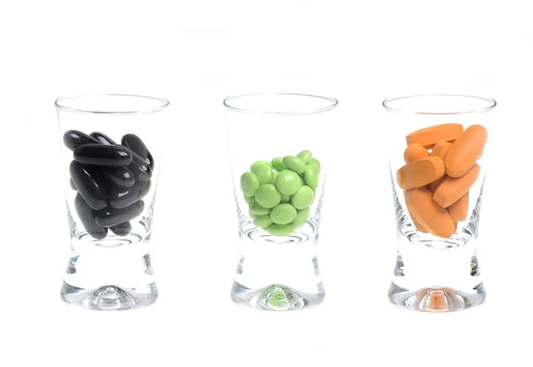 Pills in small glasses — Stock Photo, Image