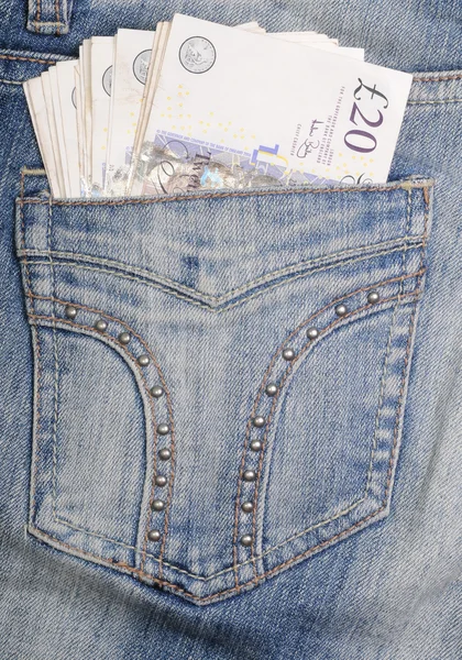 Jeans hip pocket with pounds — Stock Photo, Image