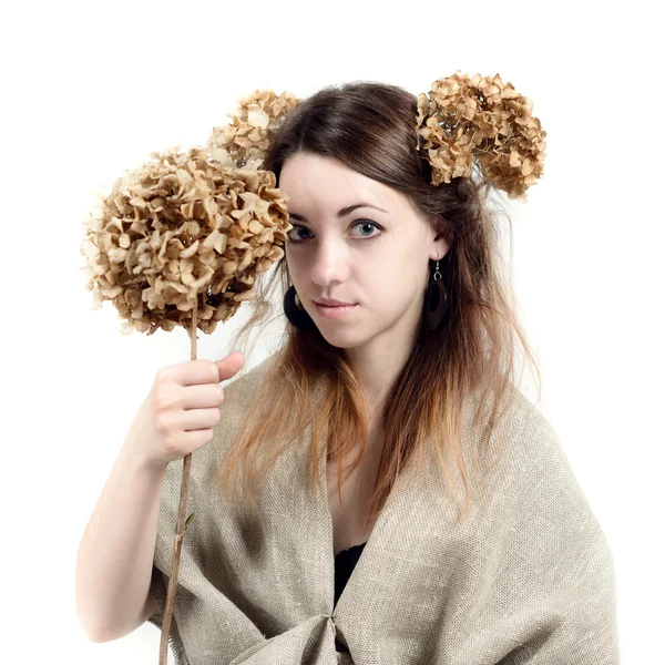 Young woman in rural style with flax and dried flowers — Stock Photo, Image