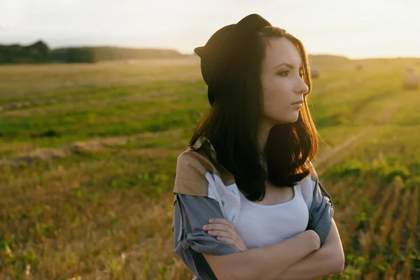 Young alonel free sad woman hipster in fall field — Stock Photo, Image