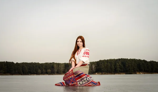 Young woman in Slavic Belarusian national original suit outdoors — Stock Photo, Image