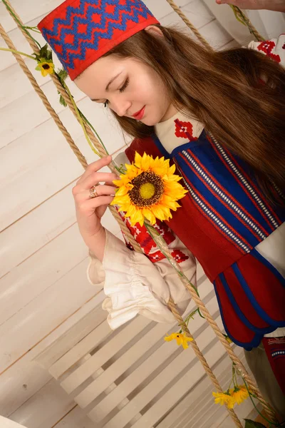 Young woman in Slavic Belarusian national original suit studio — Stock Photo, Image