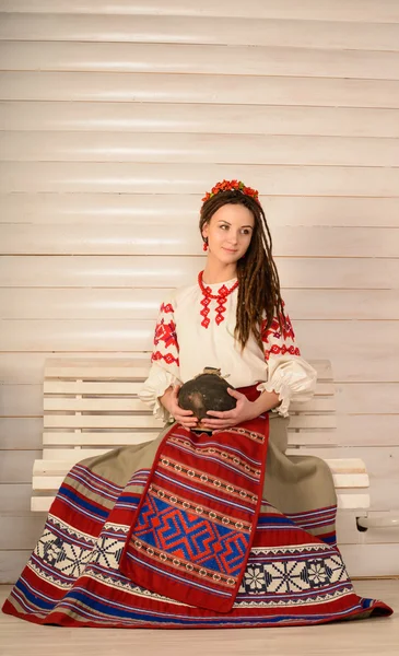 Young woman in Slavic Belarusian national original suit studio — Stock Photo, Image