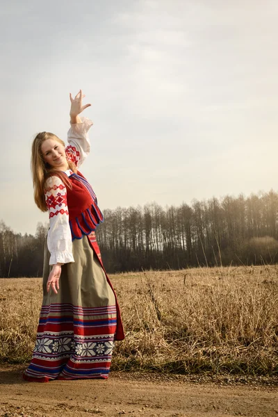 Young woman in Slavic Belarusian national original suit outdoors — Stock Photo, Image