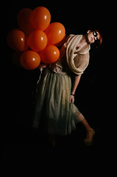 Unusual woman with balloons studio — Stock Photo, Image