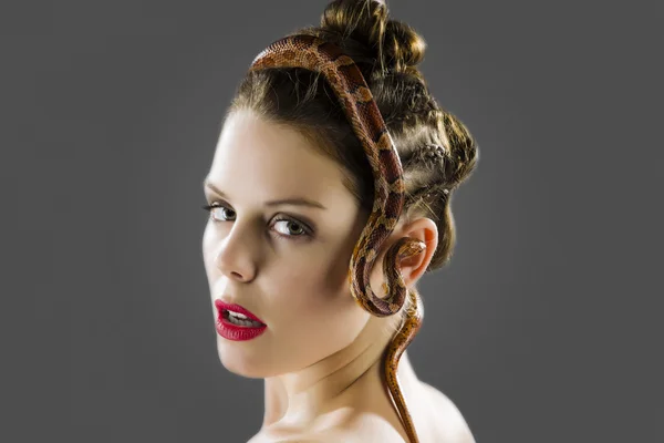 Portrait of a girl with red corn snake — Stock Photo, Image