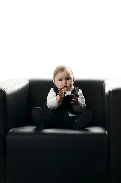 Baby girl on executive chair — Stock Photo, Image