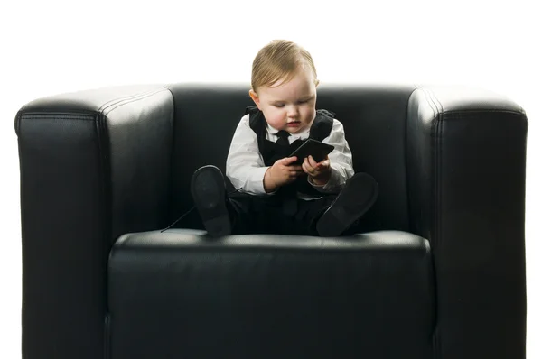 Baby girl on executive chair — Stock Photo, Image