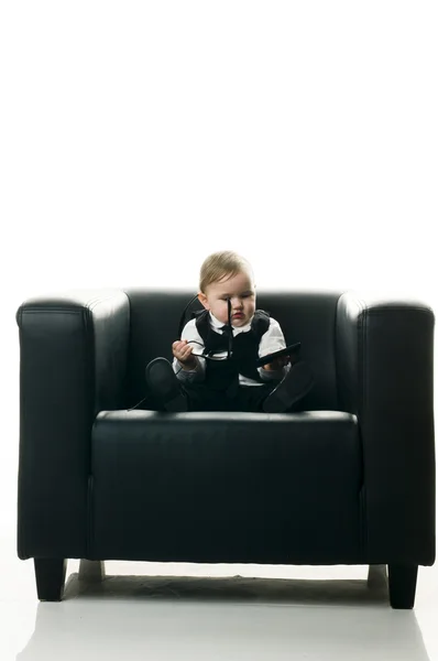 Baby girl on executive chair — Stock Photo, Image