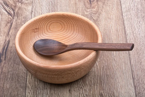 Ahşap arka plan arka plan üzerinde ahşap çatal bıçak takımı