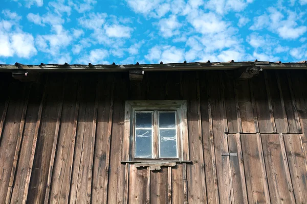 A window in a wooden wall — Stock Photo, Image