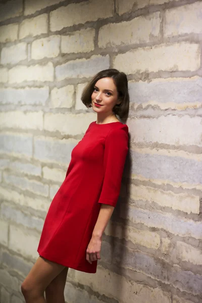 Woman in hallway and limestone wall sihouette — Stock Photo, Image