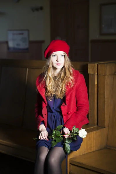 Woman in court with rose at hand — Stock Photo, Image