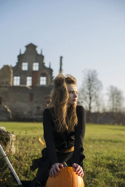 Witch with pale skin face at light — Stock Photo, Image