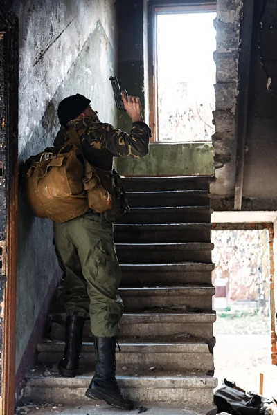 Man climbing the stairs with the danger — Stock Photo, Image