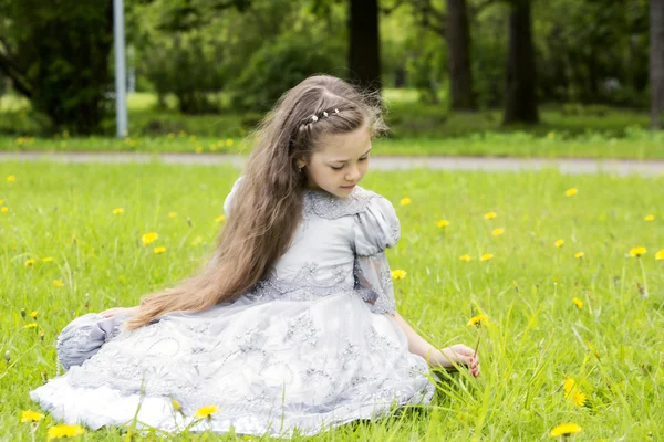 Girl looks sweet in the princess dress — Stock Photo, Image