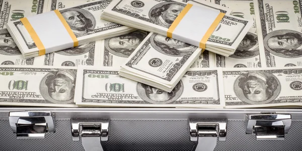 Pack of dollars in an open safe — Stock Photo, Image