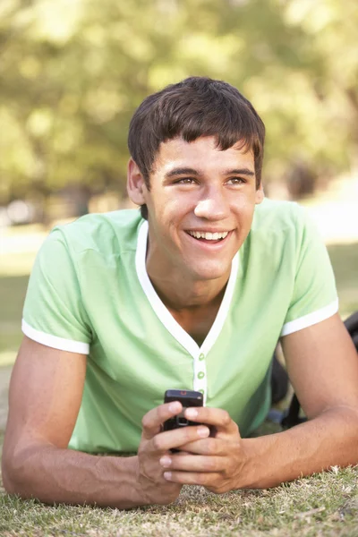 Boy Reading Message On Mobile Phone — Stock Photo, Image