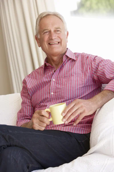 Senior Man Relaxing With Hot Drink — Stock Photo, Image