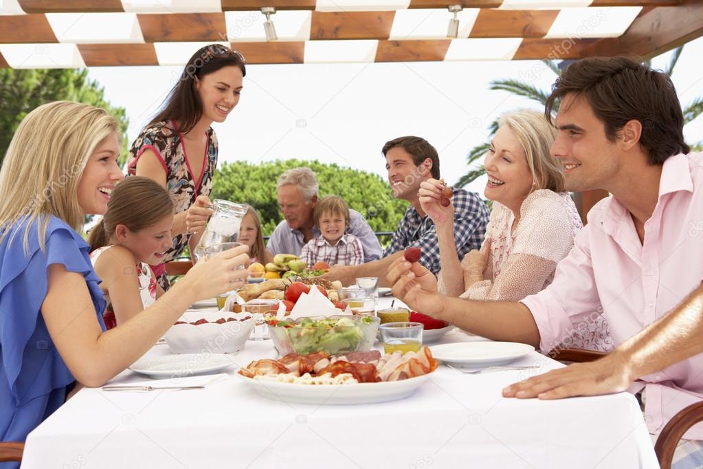 Extended Family Enjoying Meal — Stock Photo © monkeybusiness 102673558