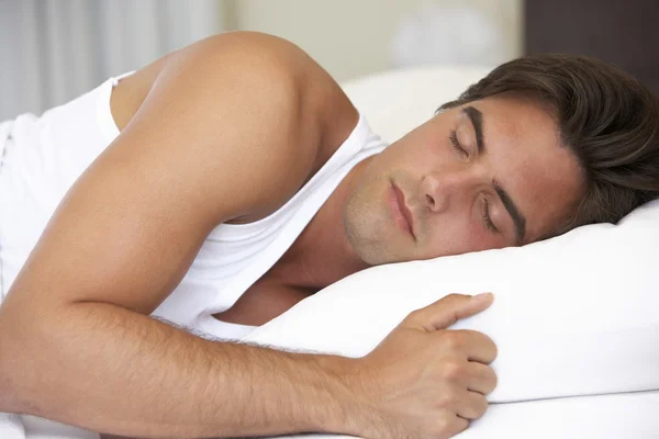 Young Man Sleeping On Bed — Stock Photo, Image