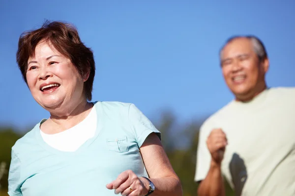 Üst düzey çift jogging — Stok fotoğraf